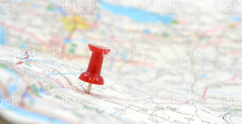 cta_wtb A pin inserted into a map, marking a location